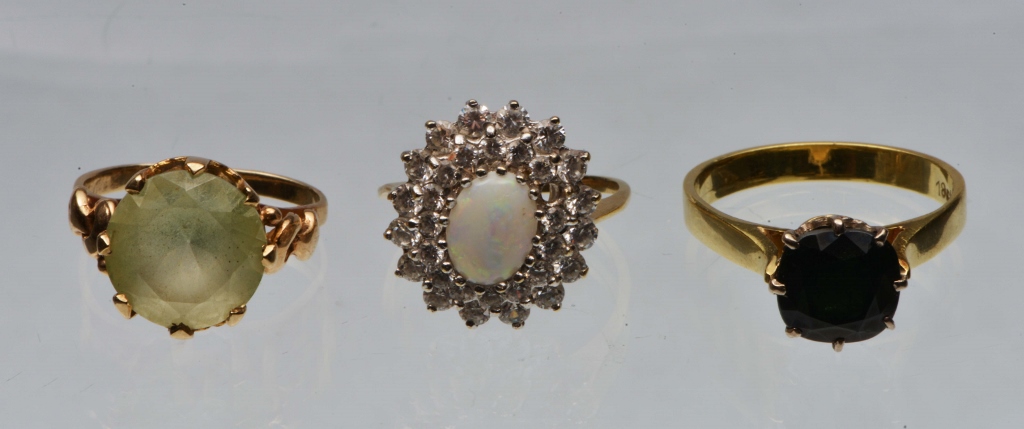 AN OPAL AND WHITE STONE CLUSTER RING set in 9ct gold and two further rings (3)