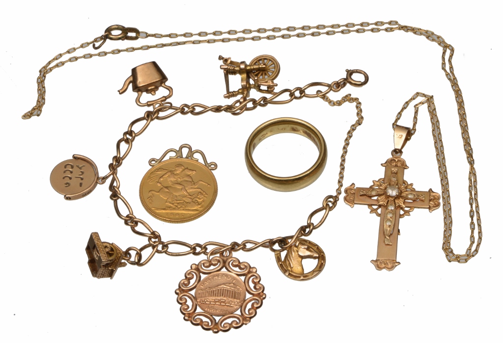 AN 18CT GOLD WEDDING BAND; a gold sovereign 1907 mounted as a pendant; a gold charm bracelet with