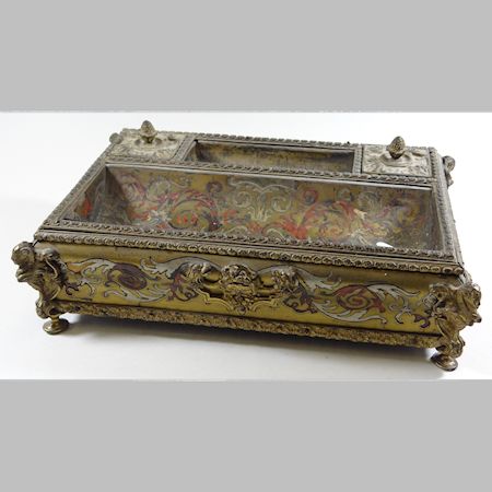 A Regency gilt bronze, scarlet tortoiseshell and cut brass Boulle decorated inkstand, with