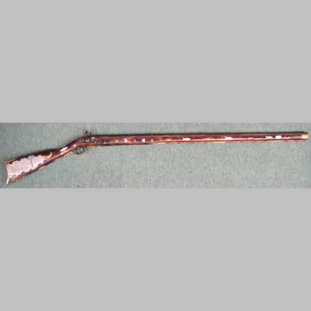 A continental inlaid and brass mounted musket, 136cm
