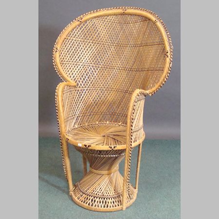 A wicker peacock chair