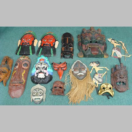 Two boxes of various tribal and other masks