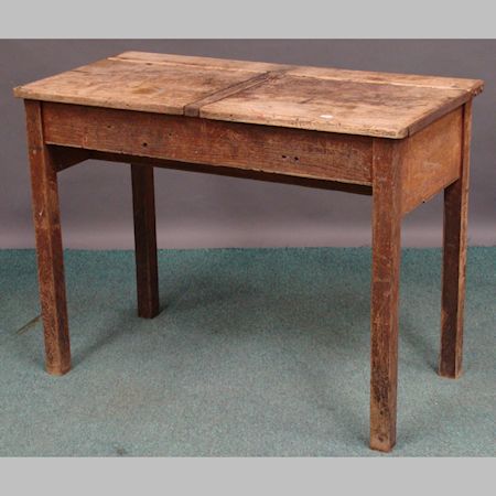 A mid-20th century oak double school desk, 102cm
