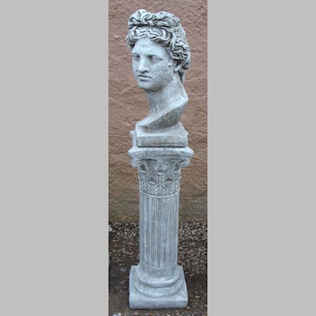 A reconstituted stone head of David, on a fluted column, 127cm tall