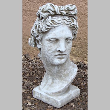 A reconstituted stone bust of David, 54cm tall