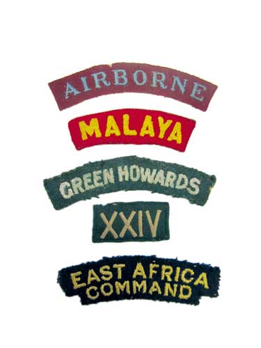 Selection of Cloth Embroidery Shoulder Titles including Airborne (curved) ... Malaya ... East Africa