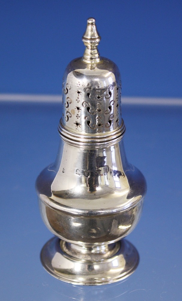 A Victorian silver pepper pot Sibray, Hall & Co., London 1877, of drop waisted baluster form with