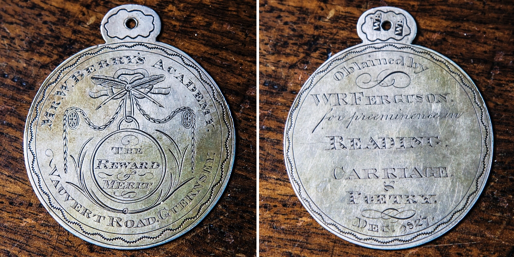 A rare George IV silver presentation school medal maker`s mark WB struck twice to the suspension