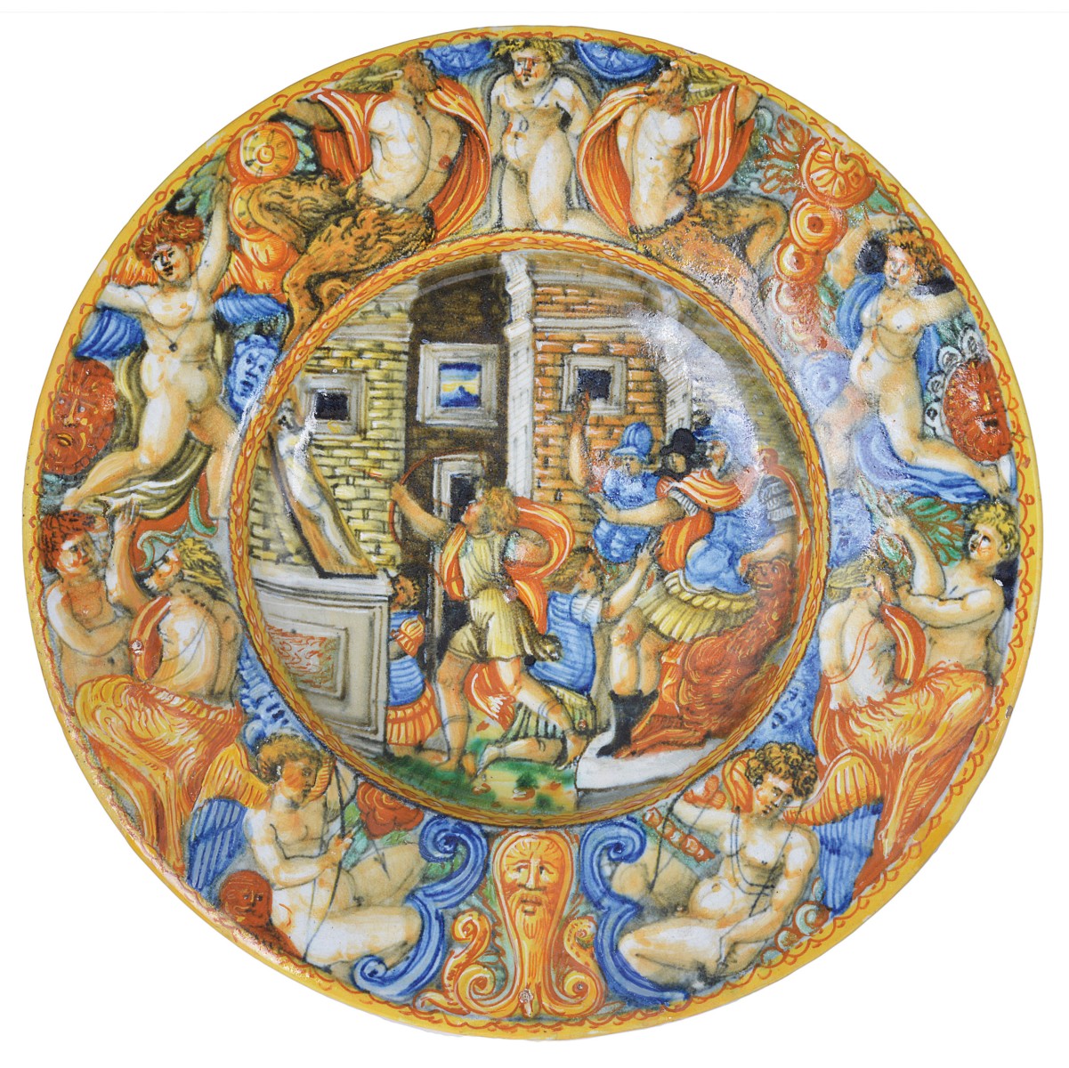 A CASTEL DURANTE ISTORIATO DISH, CIRCA 1540-1560 the centre painted the scene `Shooting the Dead