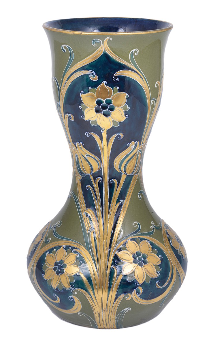 GREEN AND GOLD: A MOORCROFT MACINTYRE VASE, CIRCA 1903 tube lined with flowers in gilt and tones