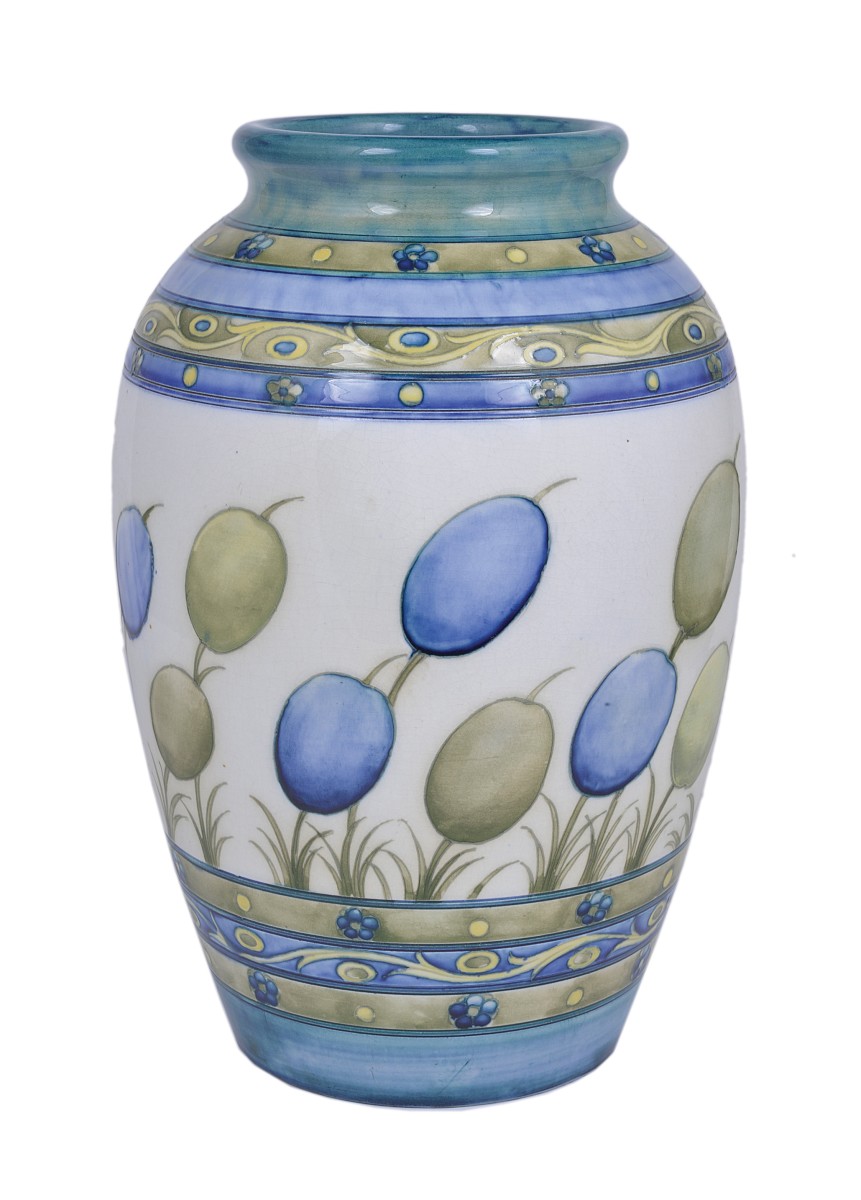 HONESTY: A MOORCROFT LARGE OVOID VASE, 1928 tube lined with a broad band of stylised flowers