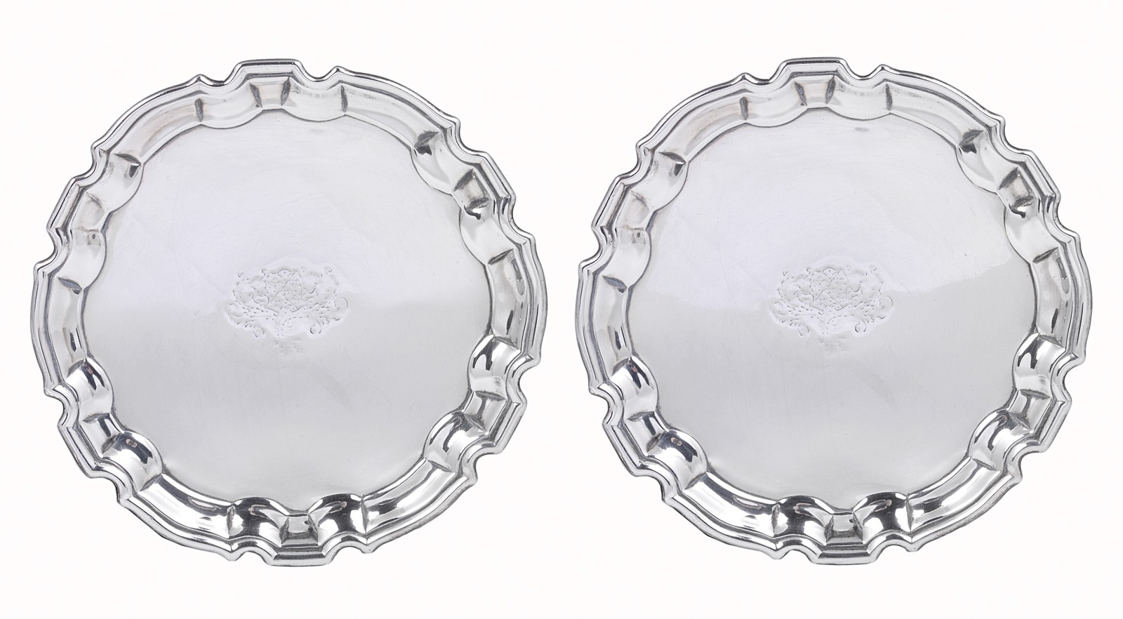 A PAIR OF GEORGE II SILVER WAITERS, JOHN TUITE, LONDON, 1740 shaped circular, later engraved with