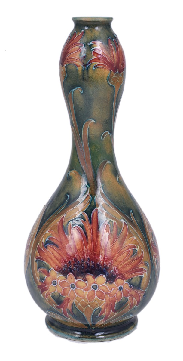 REVIVED CORNFLOWER (OR BROWN CHRYSANTHEMUM): A SMALL MOORCROFT MACINTYRE VASE, CIRCA 1910 tube lined