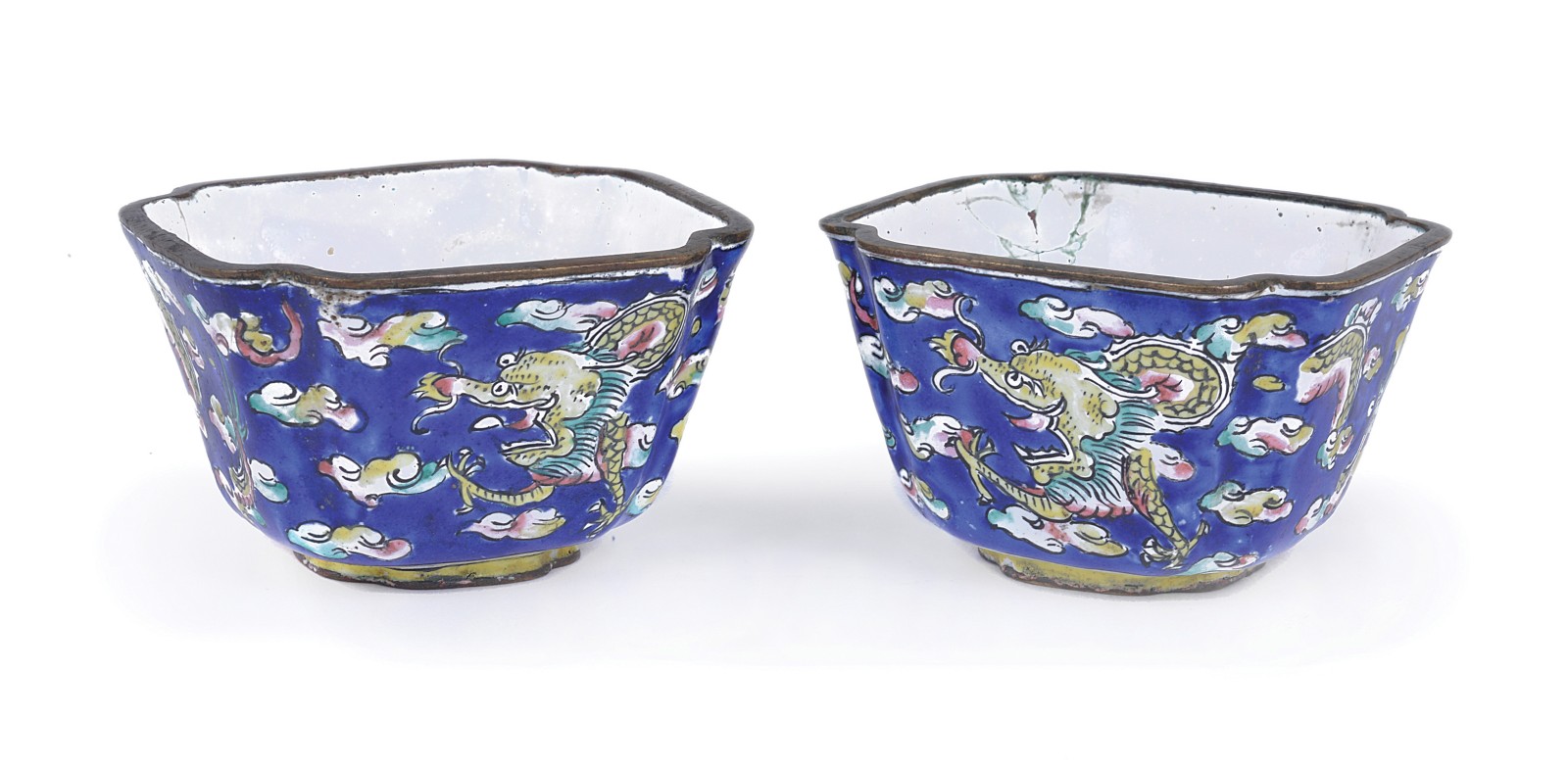 A PAIR OF CHINESE CANTON ENAMEL WINE CUPS, 19TH CENTURY with a blue ground decorated with flying