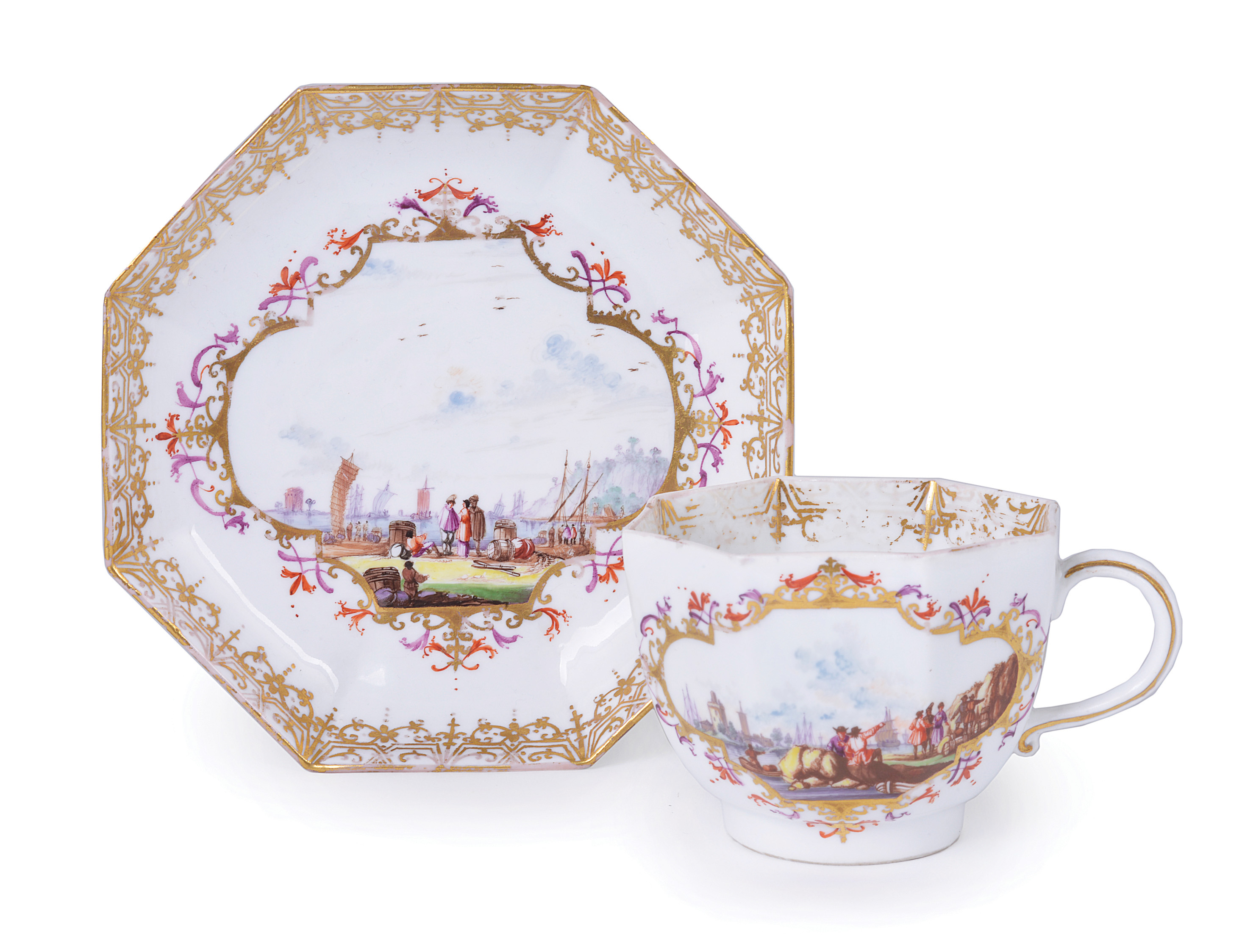 **A MEISSEN OCTAGONAL CUP AND SAUCER, CIRCA 1735 each painted with Kauffahrtei scenes within a gilt,