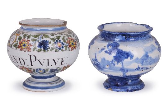 TWO ITALIAN FAEINCE DRUG JARS of footed spherical form, the first Pesaro, mid 18th century,