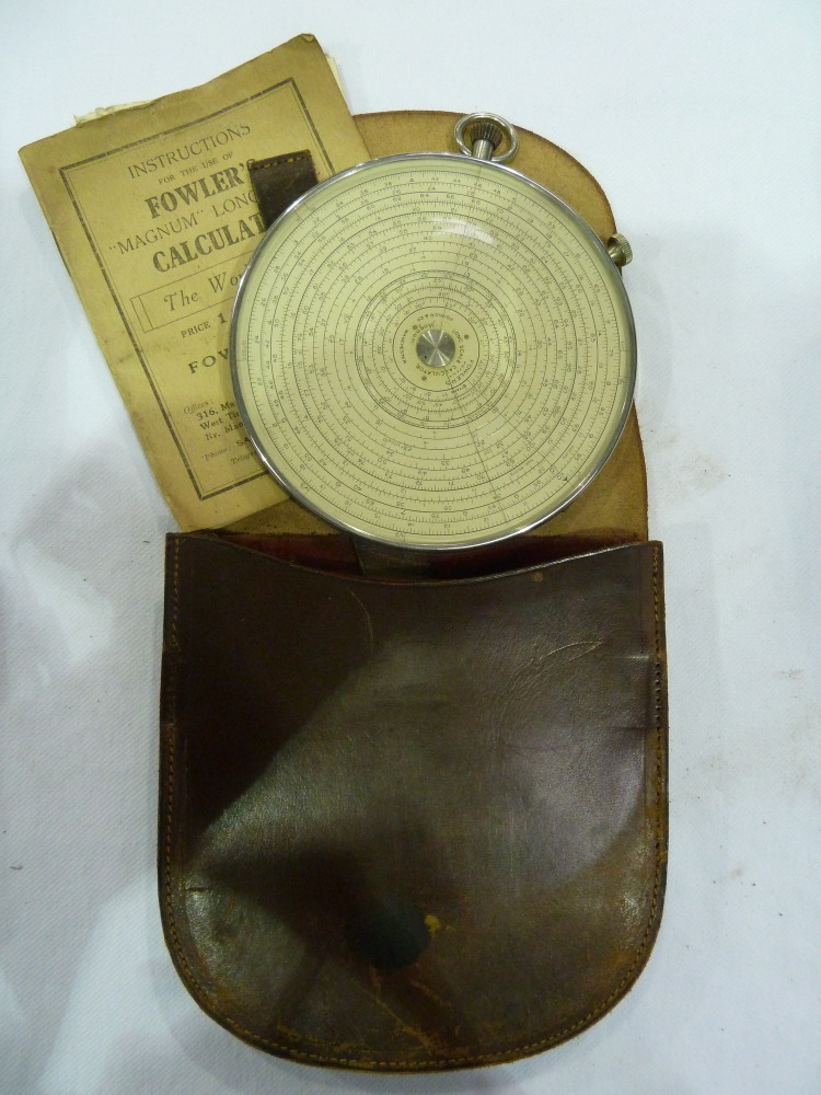 A Fowler`s "Magnum" long scale calculator, 4¾" diameter, with instruction booklet, stitched