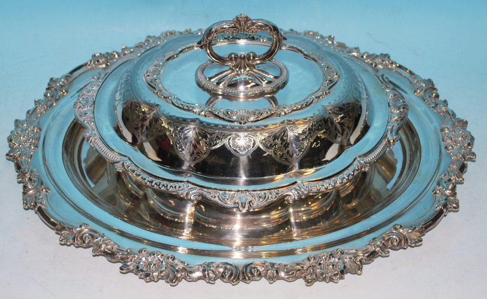 An ornate EPNS entree dish and cover; an oval tray, similar