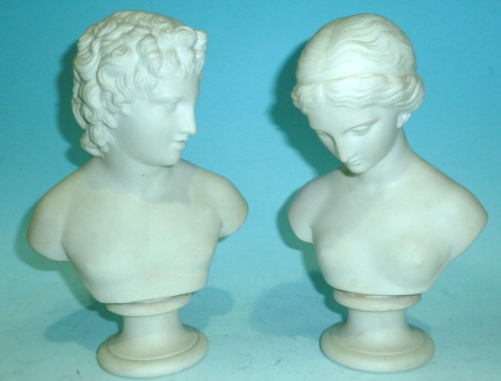 A pair of 19th century Parian busts of classical young man and woman, height 9"
