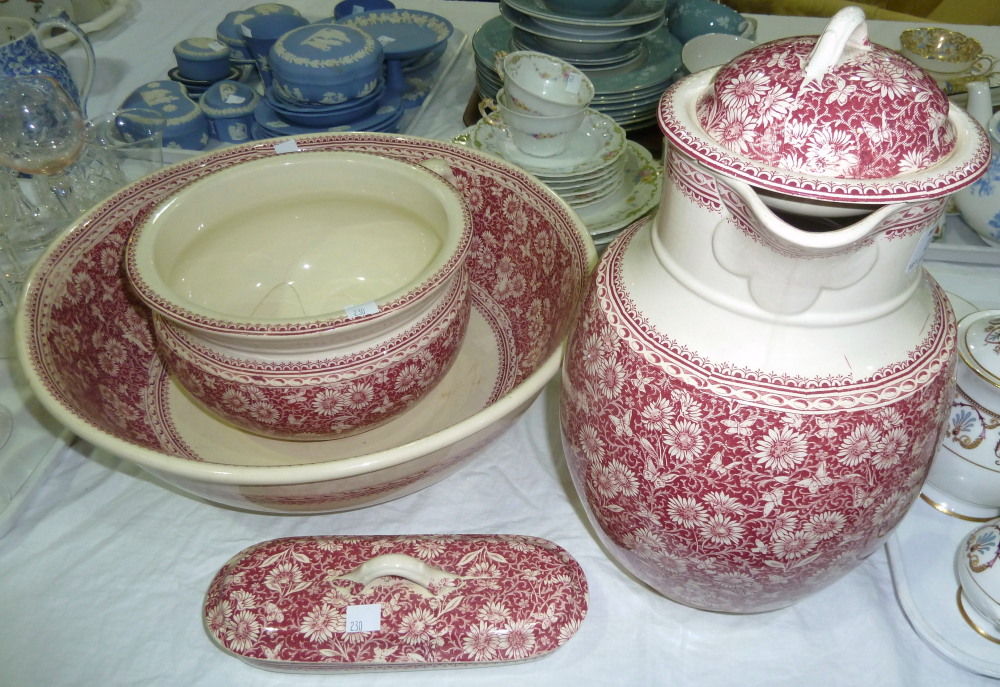 A Victorian 4 piece red and white jug and bowl set (potty a.f.)