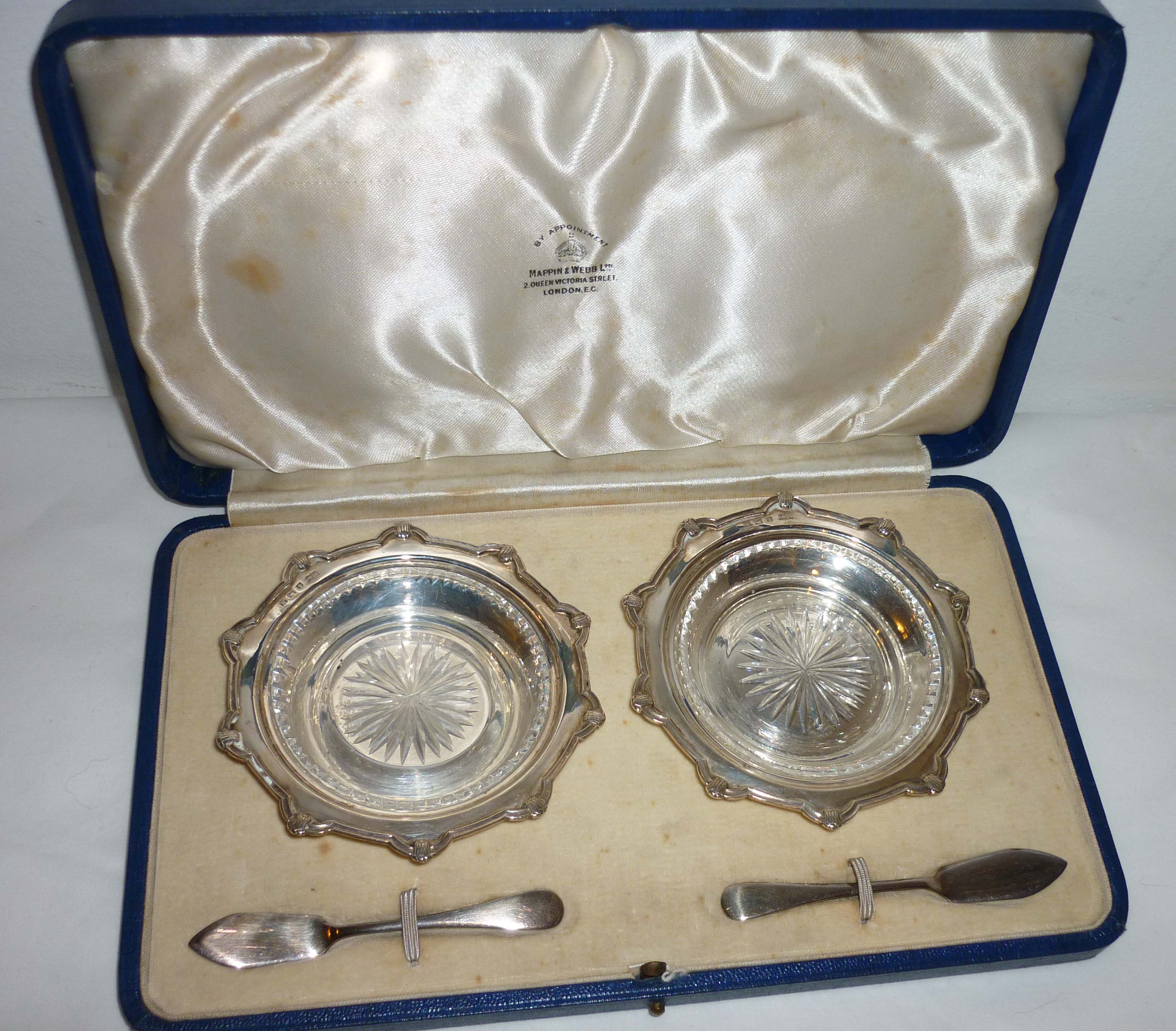 Cased pair hallmarked Birmingham Mappin & Webb silver butter dishes with glass liners and silver