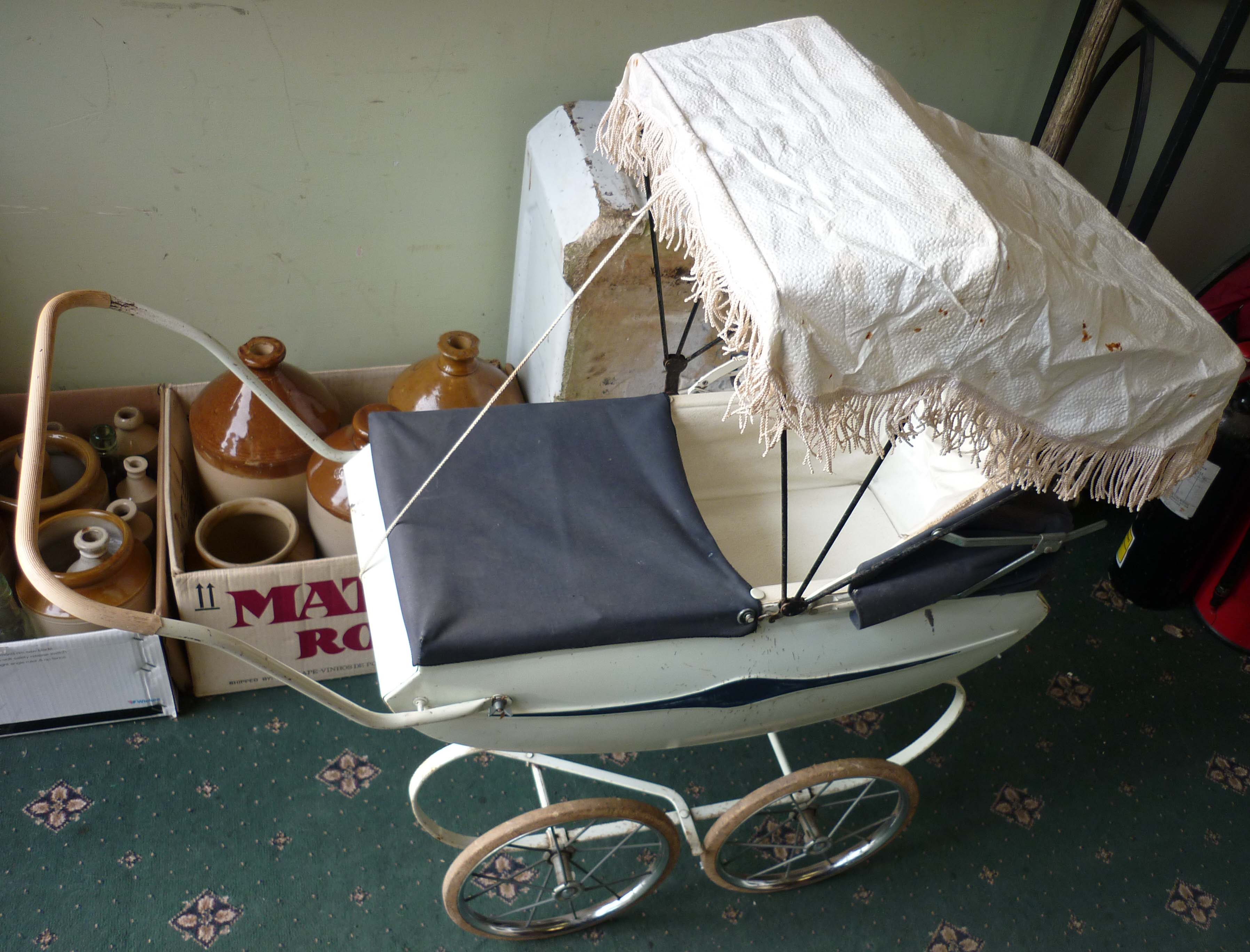 Triang doll`s pram 34” long with sun canopy