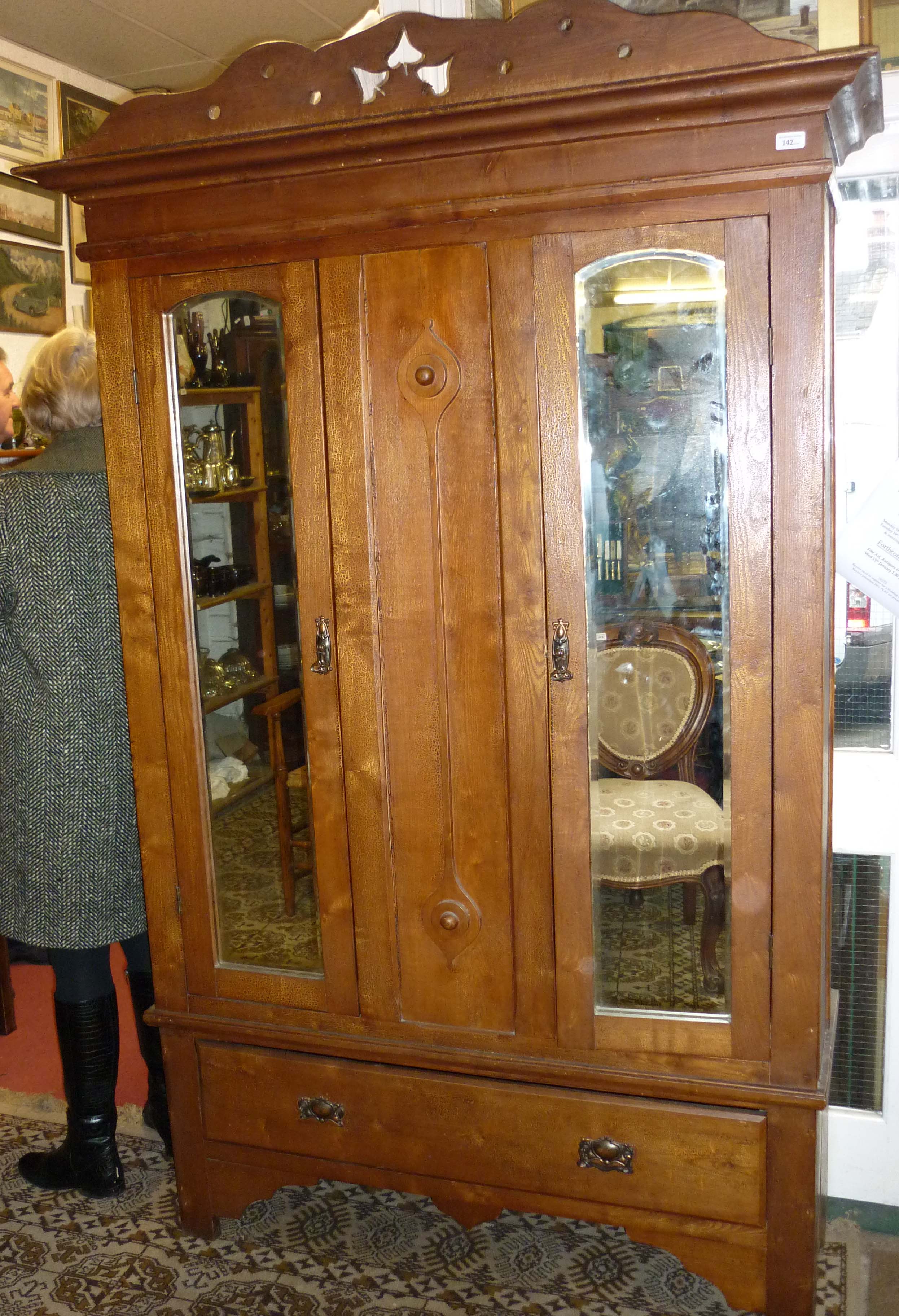 Stained pine double wardrobe with mirrored front and drawer below