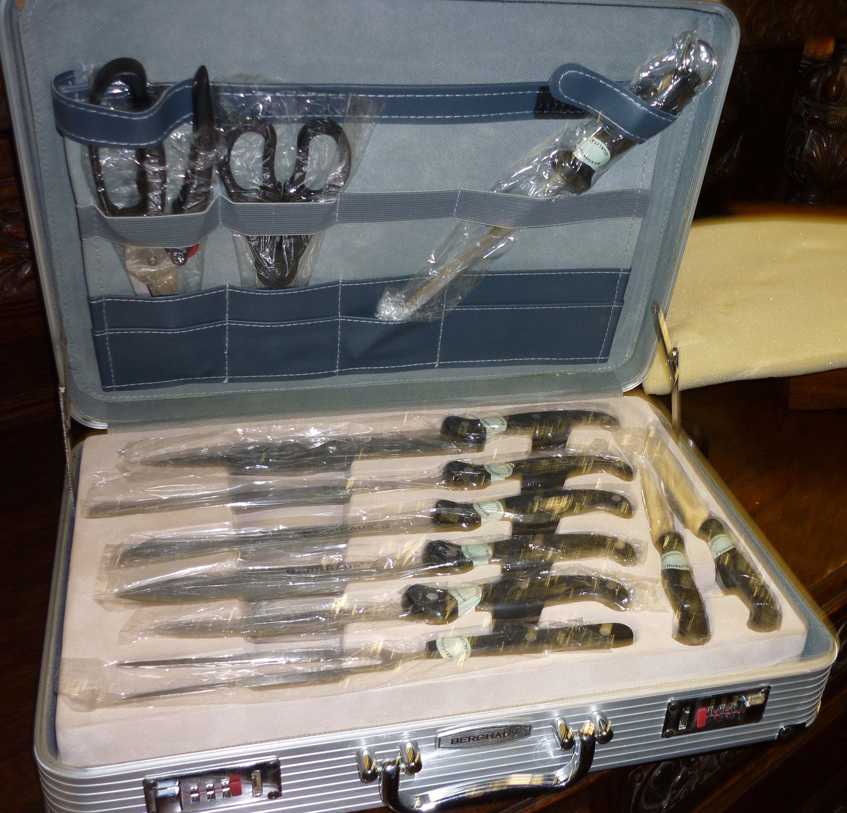 Cased Berghaus 24 piece knife set (unused)