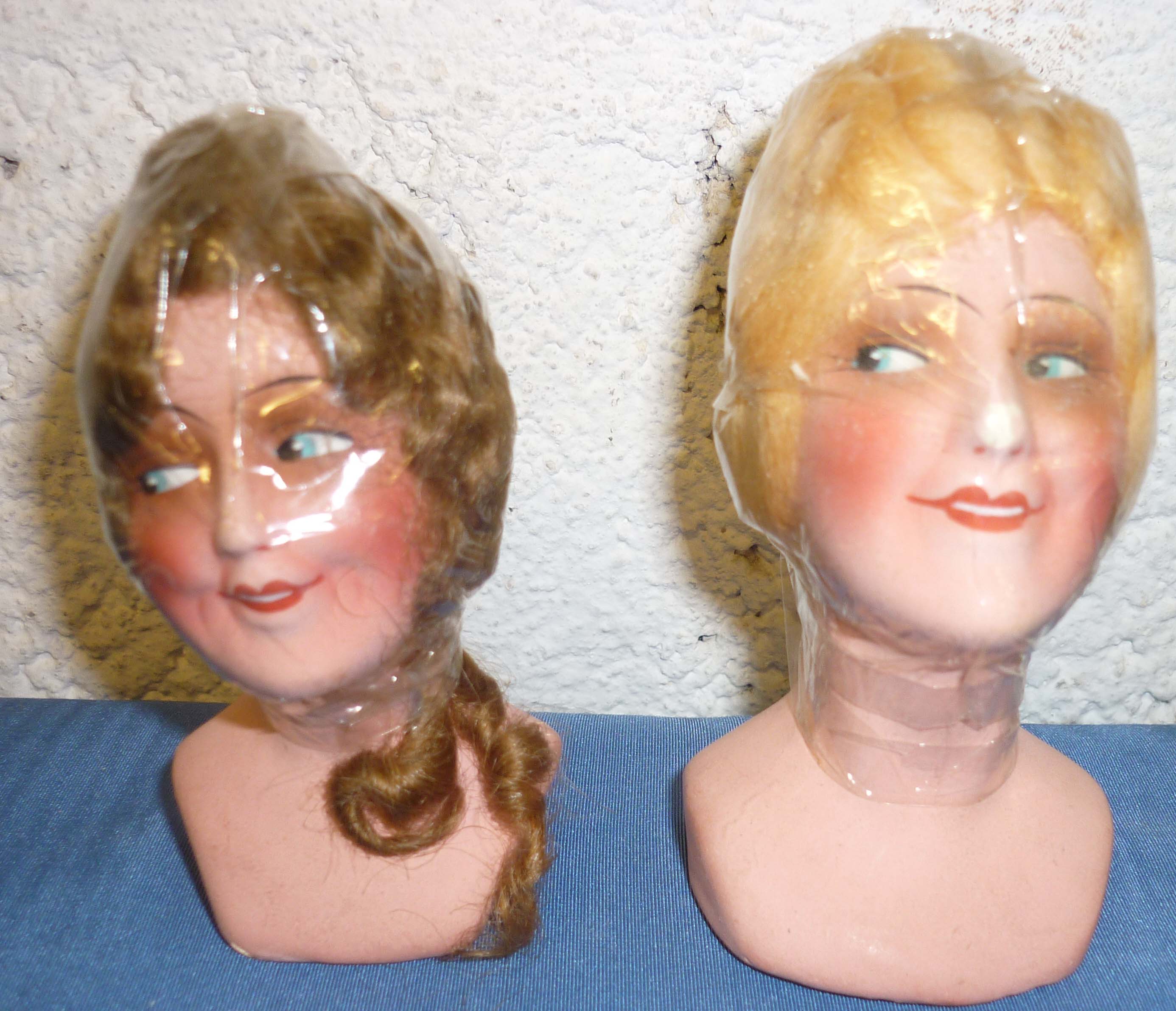 Two c1920`s painted ceramic dolls heads with wigs