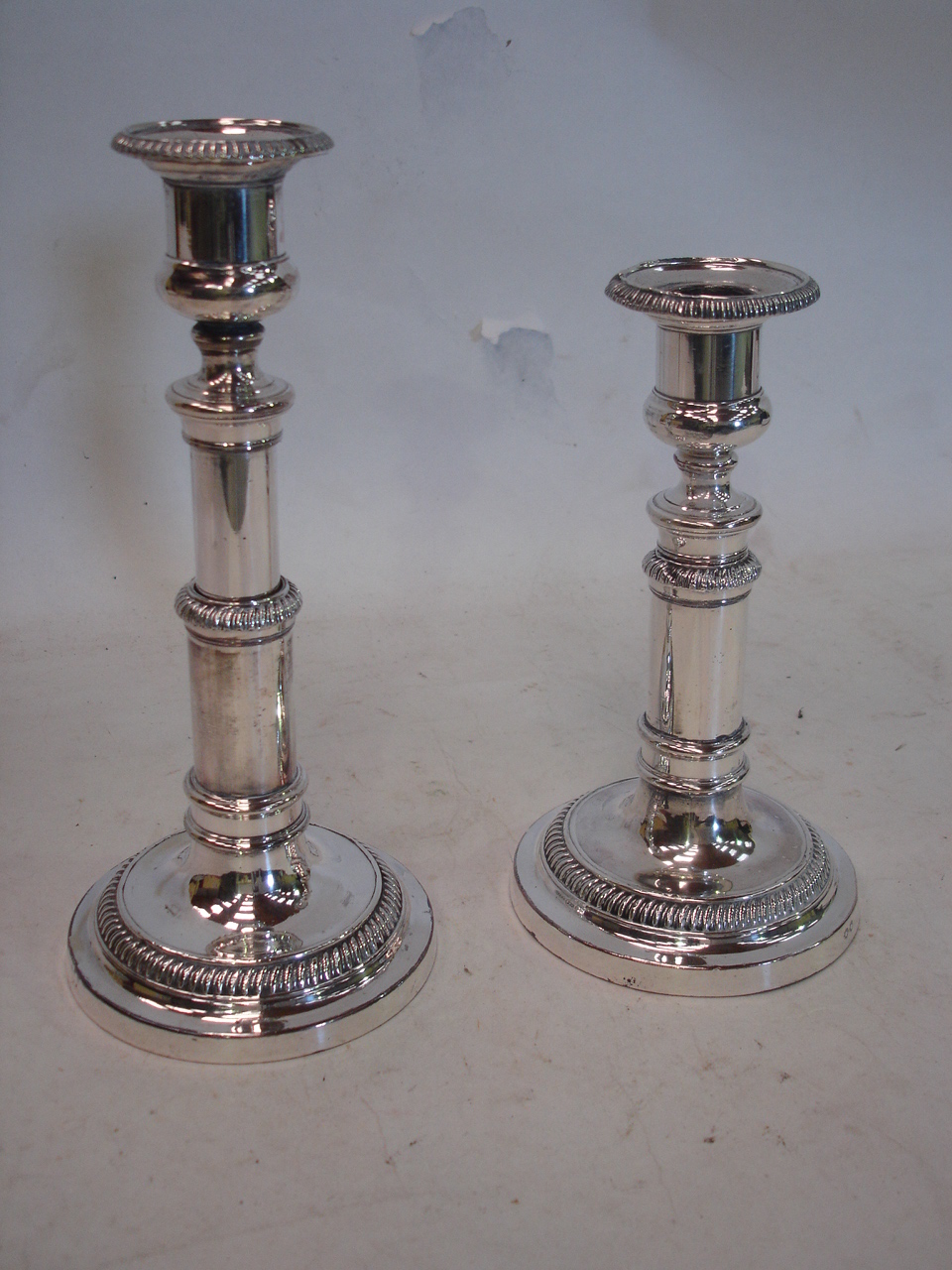 A pair of old Sheffield plate telescopic candlesticks. Double star marks for Matthew Boulton. 8"