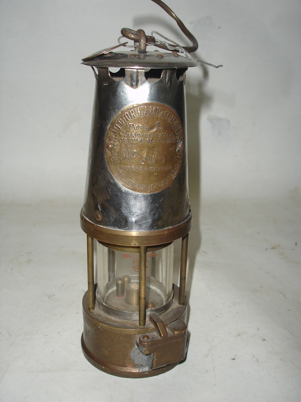 A miners protector lamp, 9" high