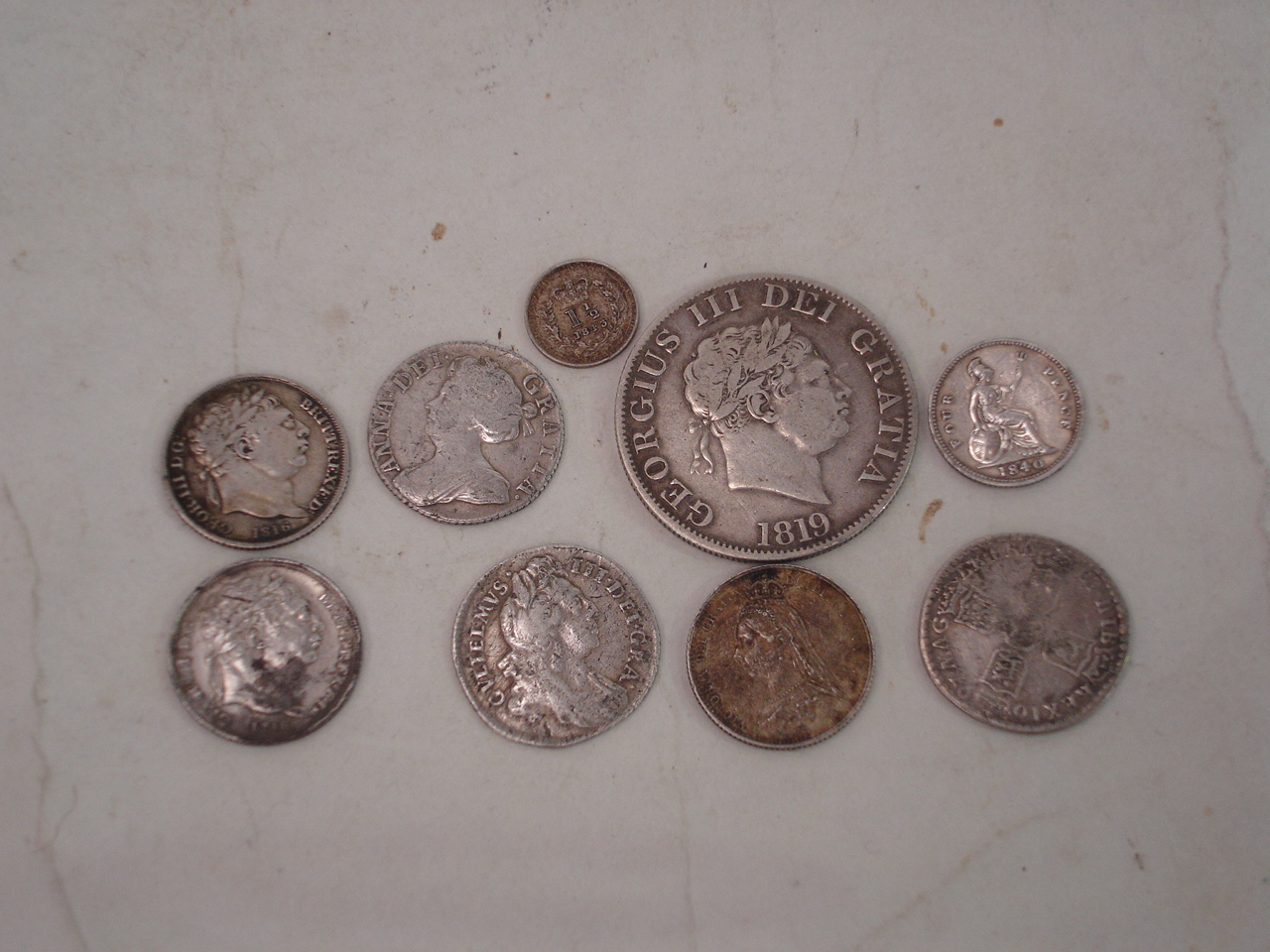 Nine silver English coins