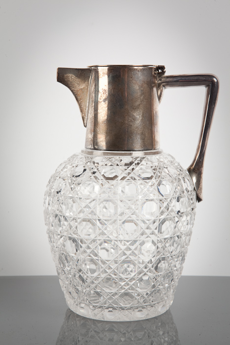 EARLY TWENTIETH CENTURY SILVER MOUNTED CLARET JUGmaker Mappin & Webb, with hobnail cut glass body,