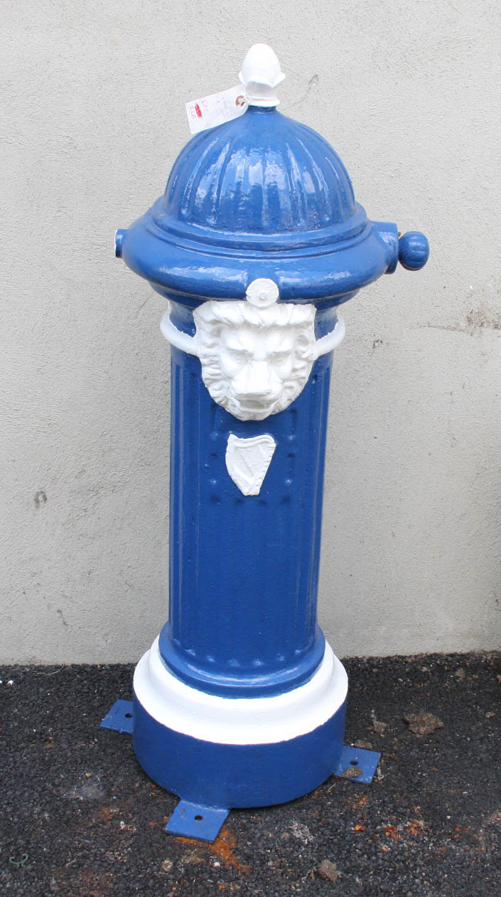 AN IRISH STREET SIDE CAST IRON WATER FOUNTAIN, 
painted blue and white, with acorn finial on a domed
