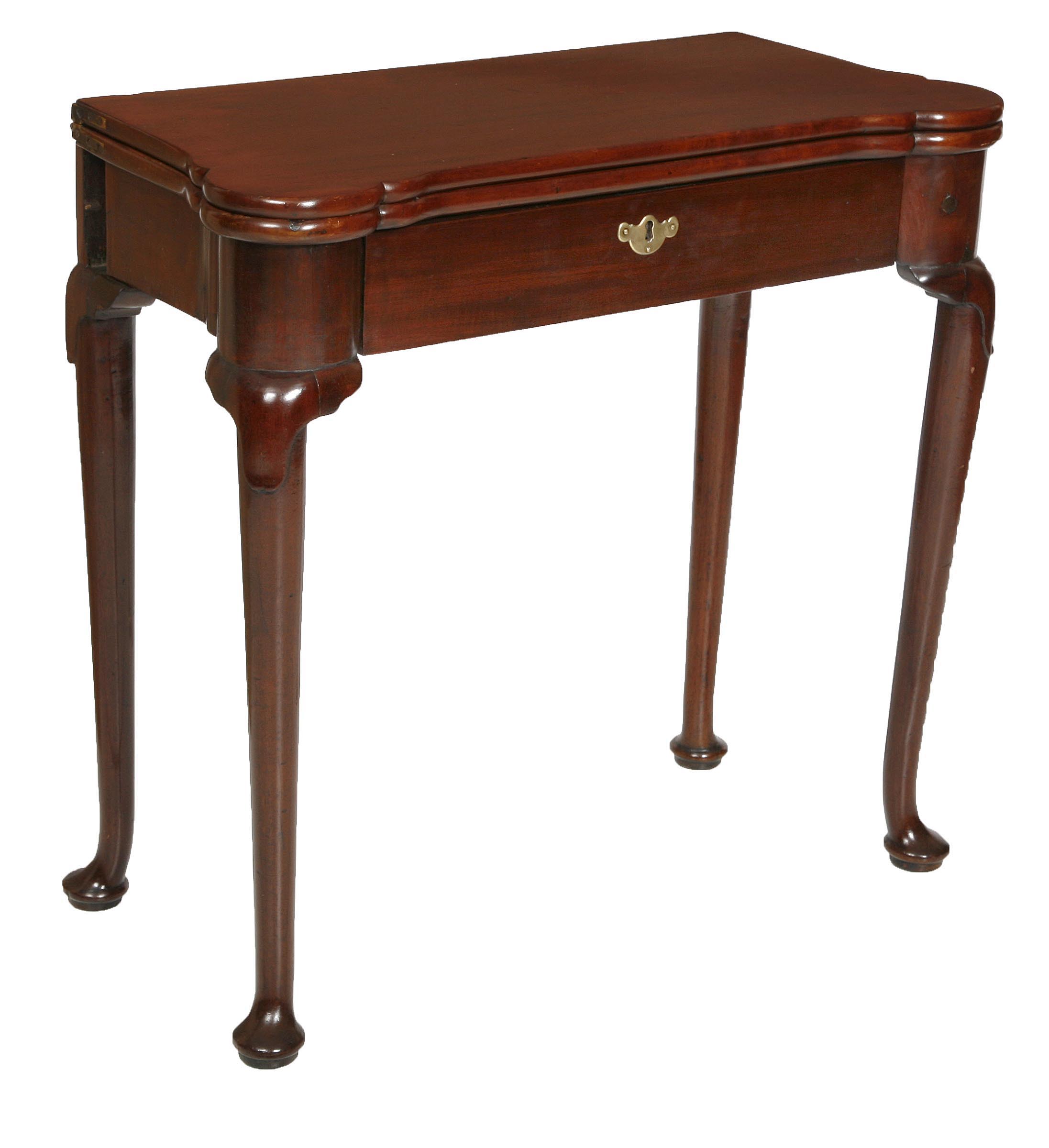 A MAHOGANY FOLDOVER GAMES TABLE,
George II and later, the top with projecting rounded corners and