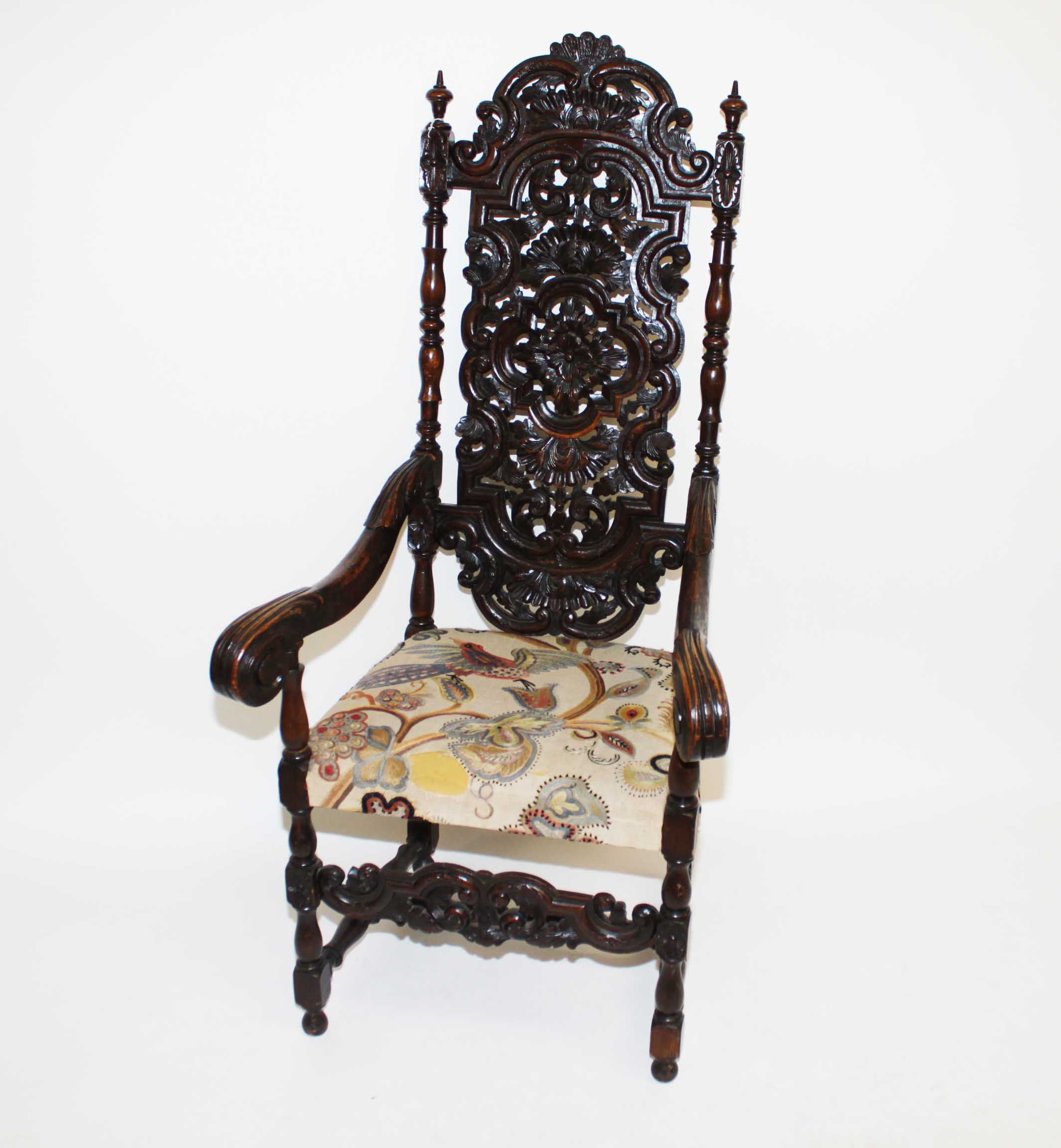 A LARGE HIGH BACK CARVED WALNUT THRONE CHAIR, 
in the 17th century style, the arched and pierced