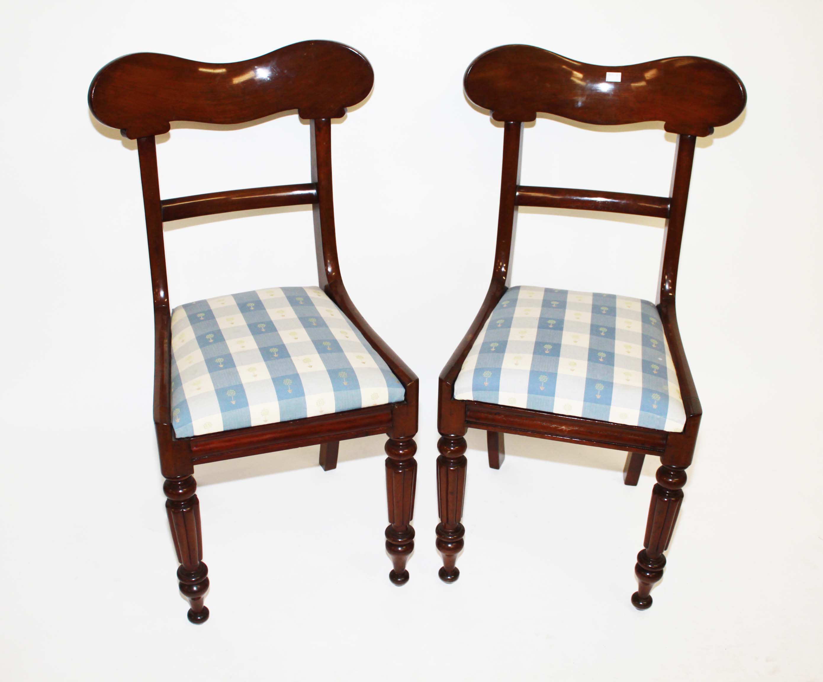 A SET OF SIX WILLIAM IV PERIOD MAHOGANY DINING CHAIRS, 
each with a shaped top rail and a curved