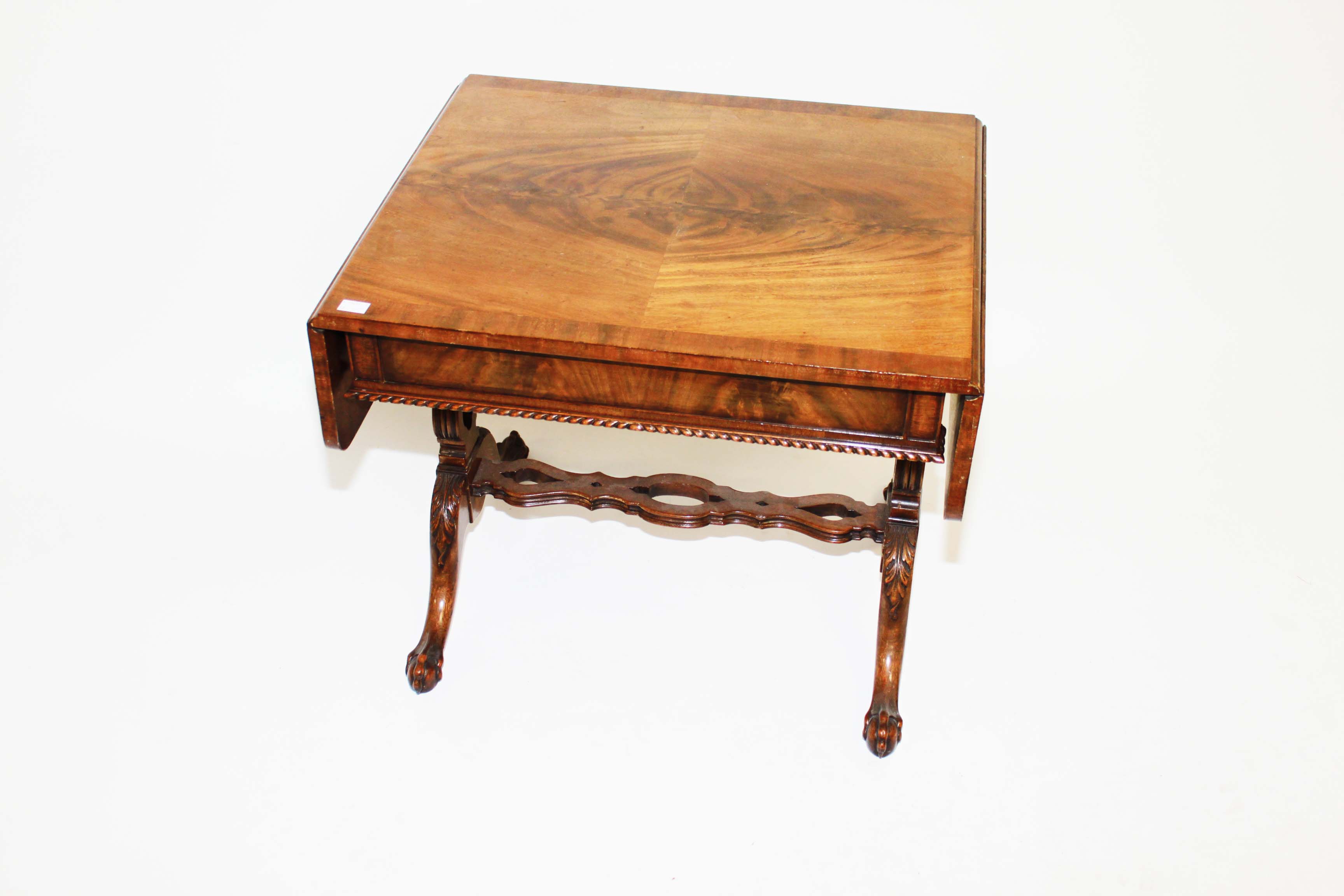 A Cross Banded Mahogany Occasional Table,
in the form of a sofa-table, O.R.M., with two D shaped