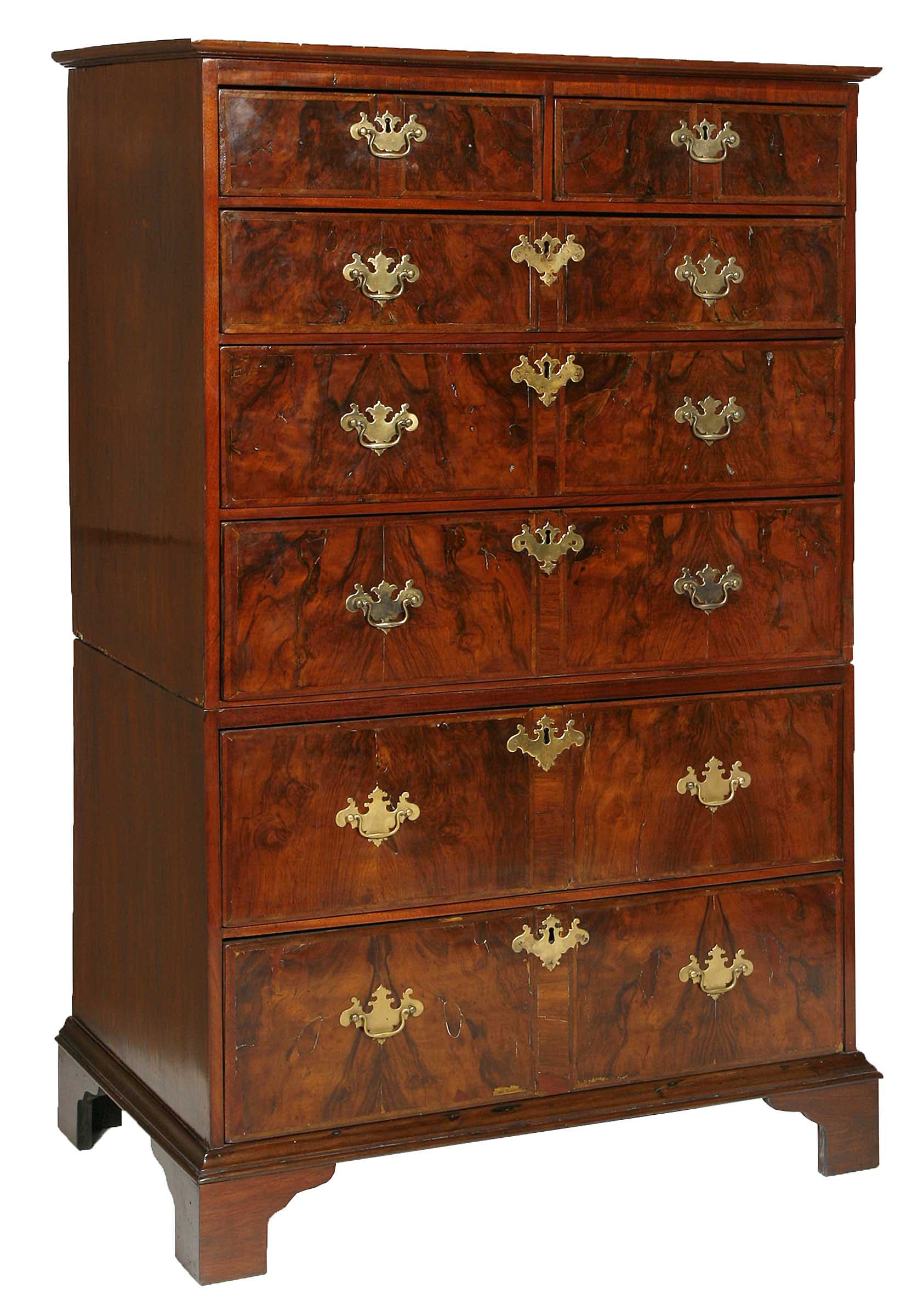 AN EIGHTEENTH CENTURY FIGURED WALNUT CHEST ON CHEST, 
the moulded top above five long and two