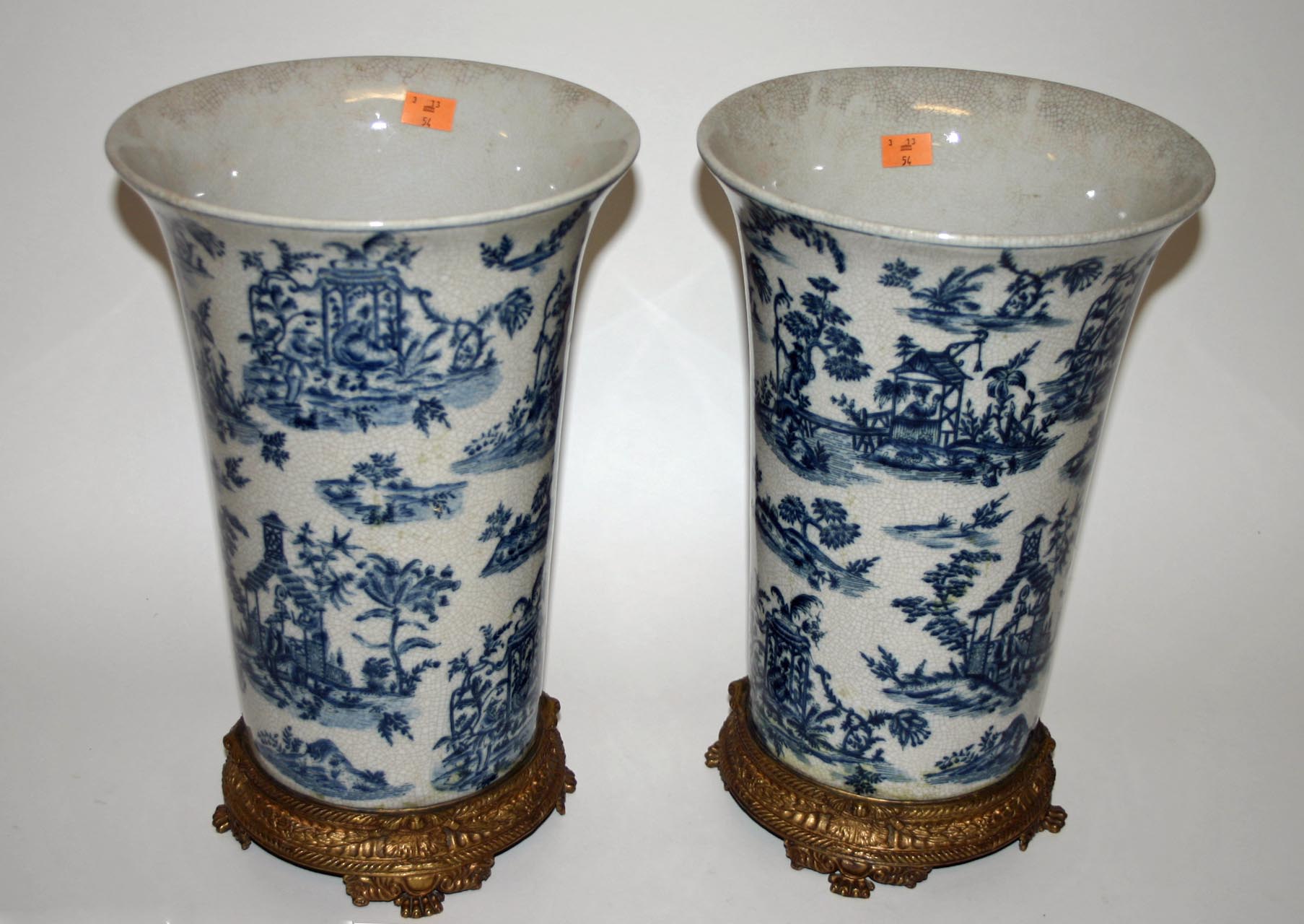 A PAIR OF CHINESE BLUE AND WHITE CRACKLEWARE VASES, O.R.M., each with Chinoiserie decoration on a