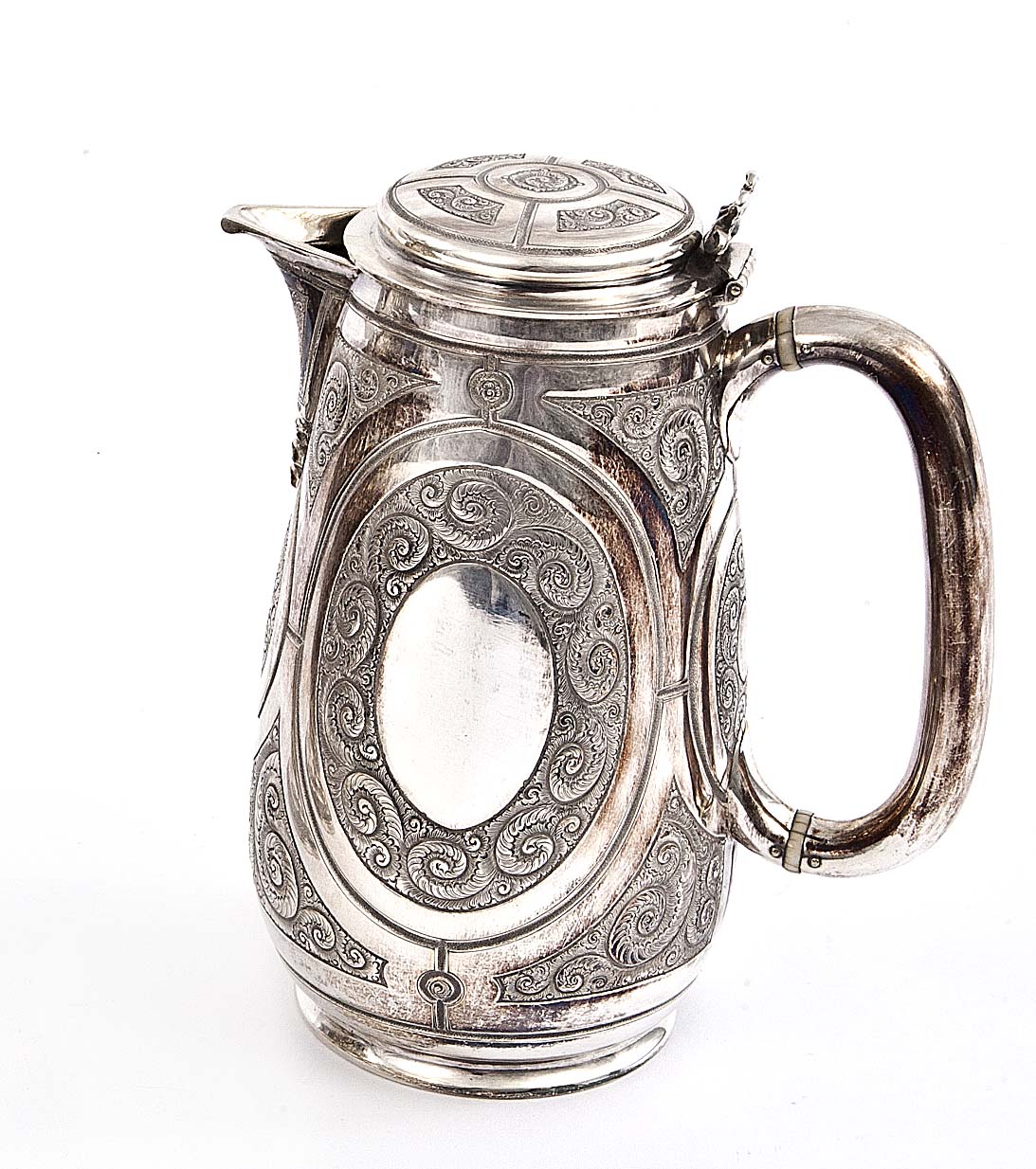 A VICTORIAN SILVER HOT WATER POT, Sheffield 1873, chased with scrolls on geometric panels, 7.5in (