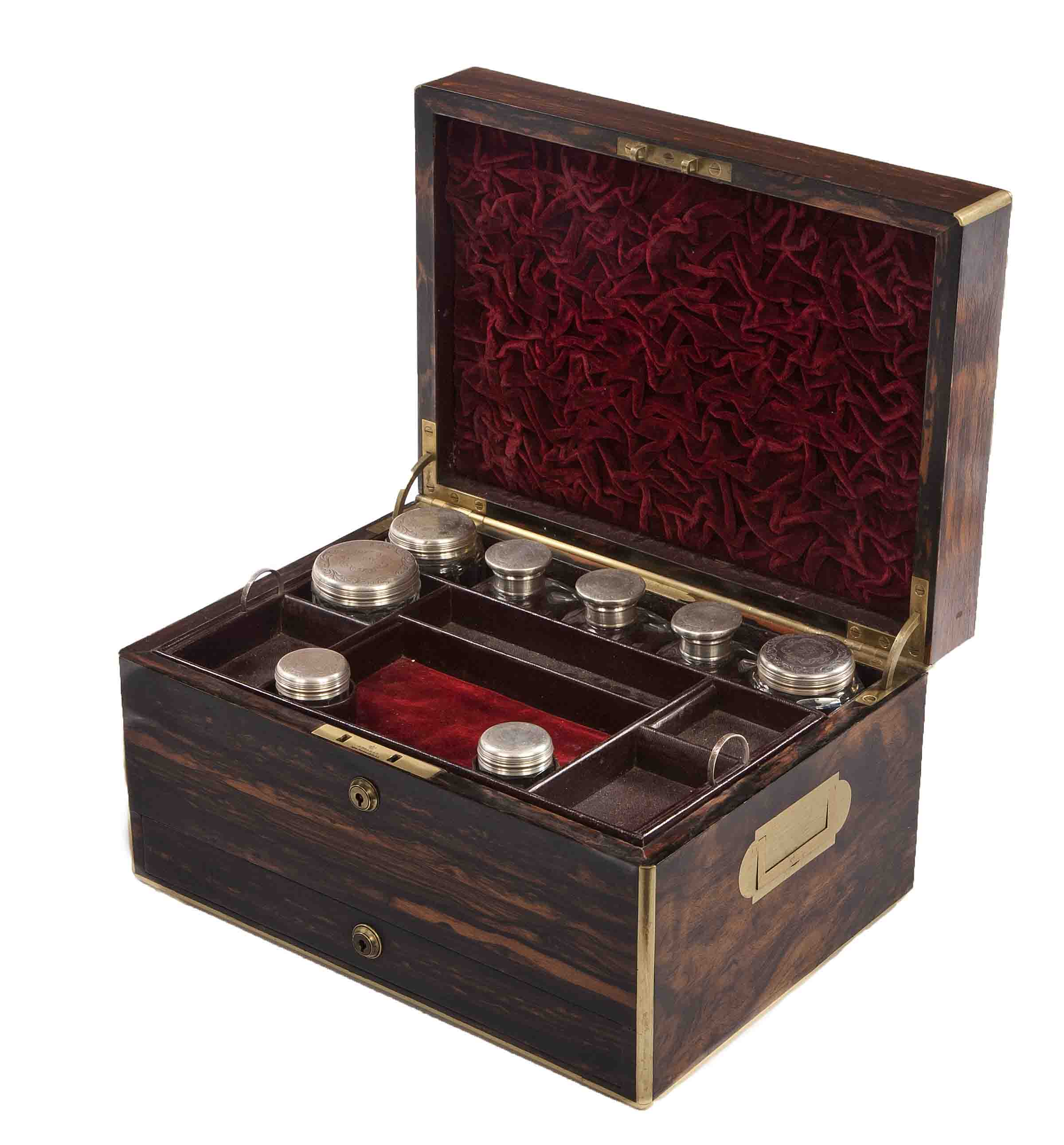 A VICTORIAN BRASS-BOUND COROMANDEL WOOD GENTLEMAN’S VANITY CASE, the hinged cover opening to