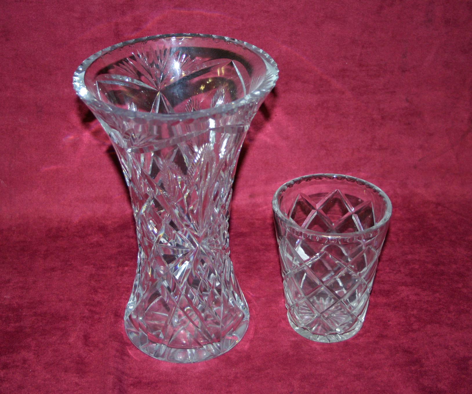A TALL HEAVY CUTGLASS VASE, of waisted form, 12in (31cm); and a small tapering cylindrical