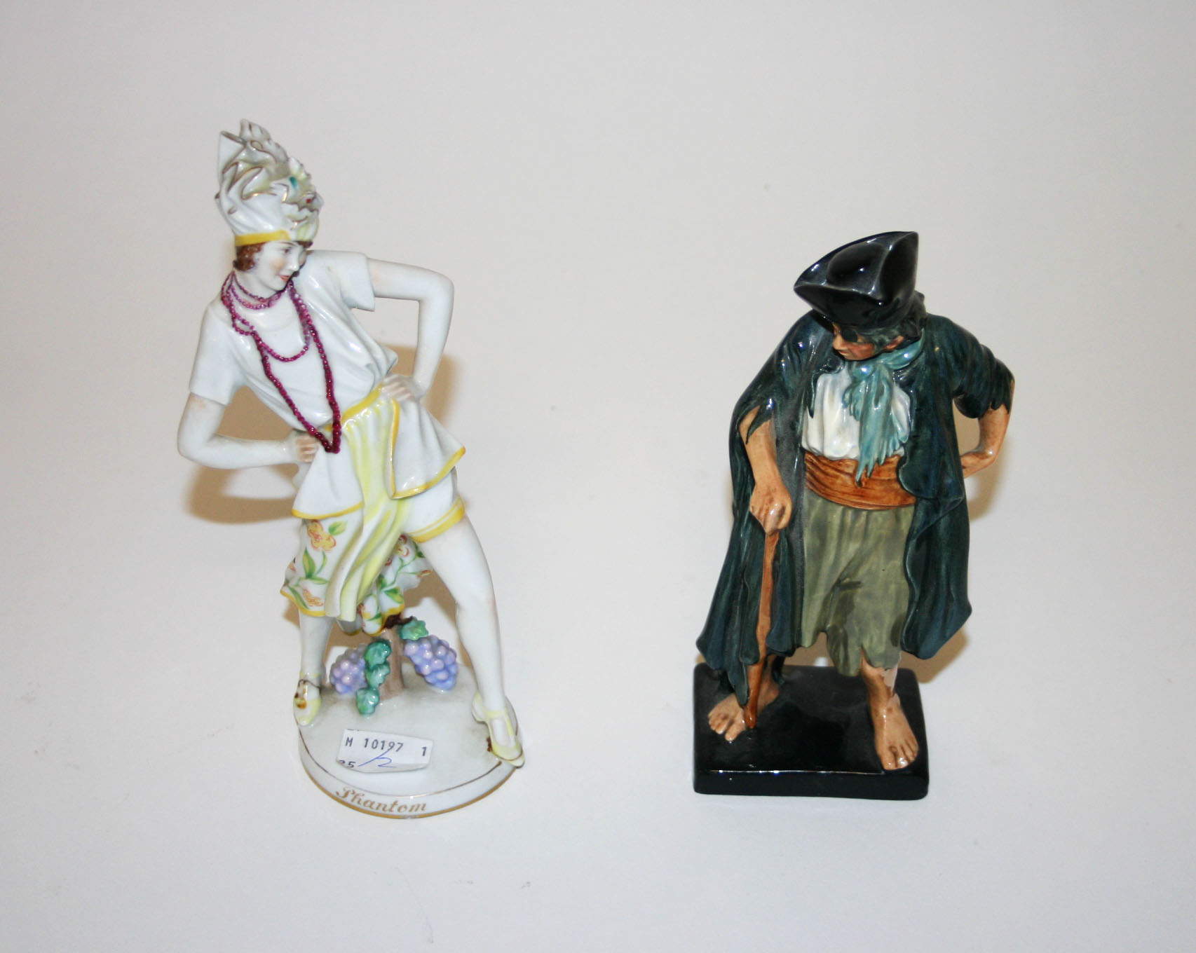 A WEIN PORCELAIN DANCING FIGURE, in 1920s dress, inscribed Phantom 8in (20cm); and a Royal Doulton