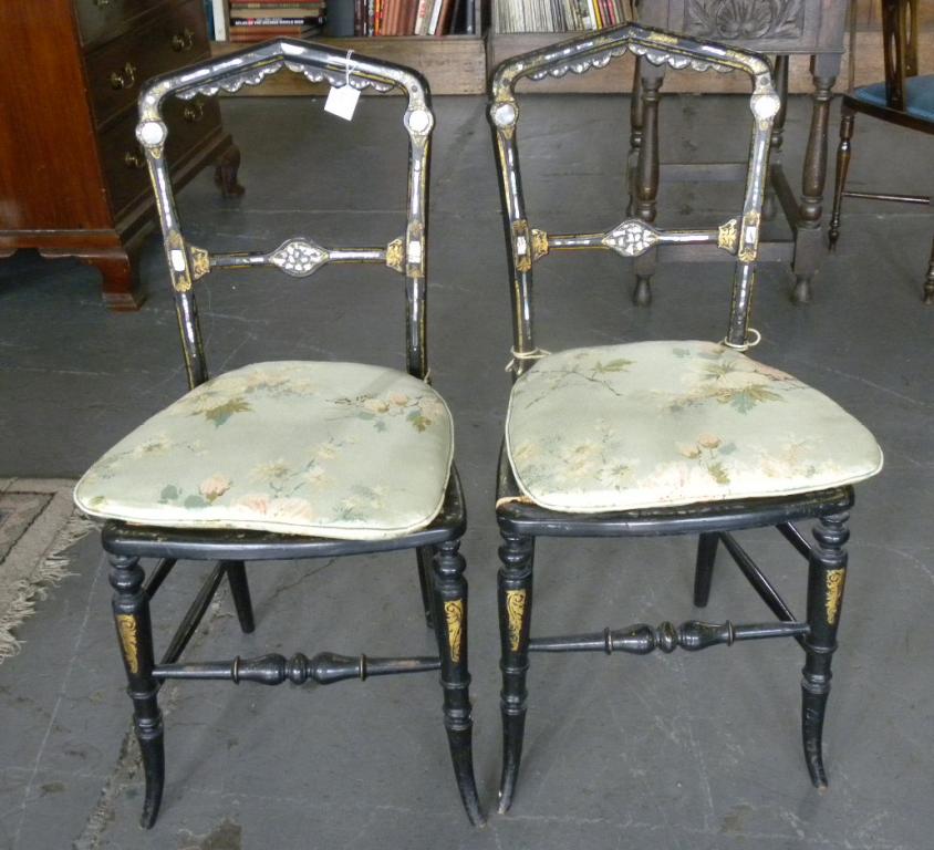 A PAIR OF VICTORIAN PAPIER MÂCHÉ BEDROOM CHAIRS, INLAID WITH MOTHER OF PEARL AND GILT, CANED SEAT