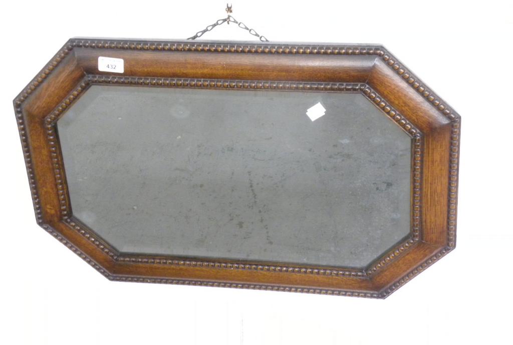 A MAHOGANY OVAL CHEVAL MIRROR, LACKS STAND, A MAHOGANY DRESSING MIRROR AND AN OAK OVERMANTLE
