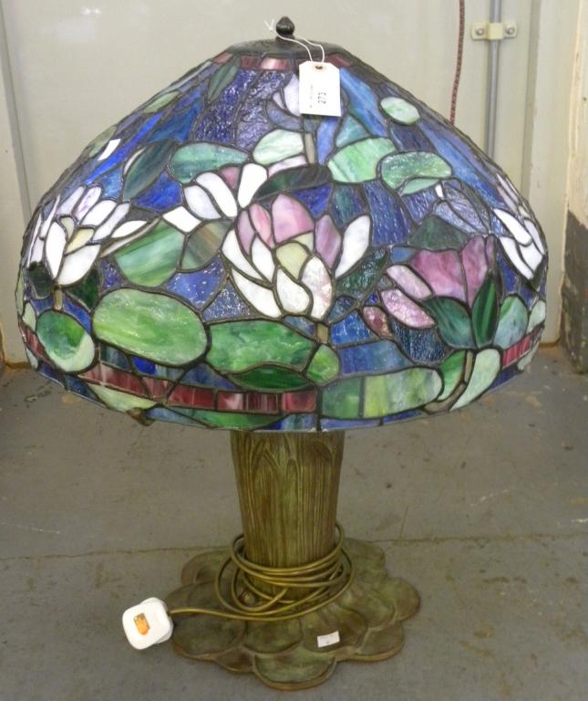 A BRONZE WATERLILY LAMP AND LEADED GLASS LAMPSHADE IN TIFFANY STYLE, GREEN PATINA, LATE 20TH C