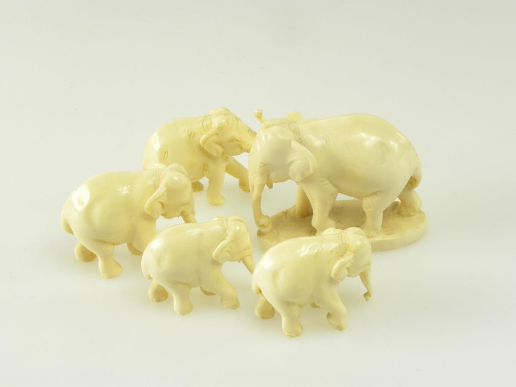 FOUR INDIAN GRADUATED IVORY CARVINGS OF ELEPHANT