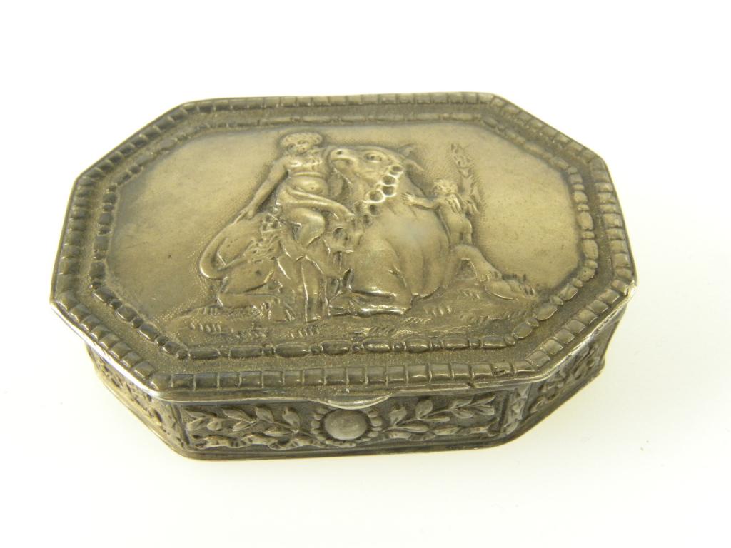 A CONTINENTAL SILVER CUT CORNERED SNUFF BOX, THE LID EMBOSSED WITH EUROPA AND THE BULL, LATE 19TH C