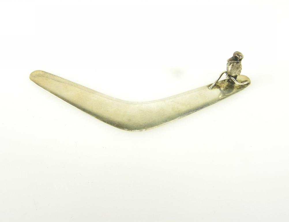AUSTRALIA. AN AUSTRALIAN SILVER BOOMERANG AND KOOKABURA LETTER KNIFE MARKED STG AND WITH TWO